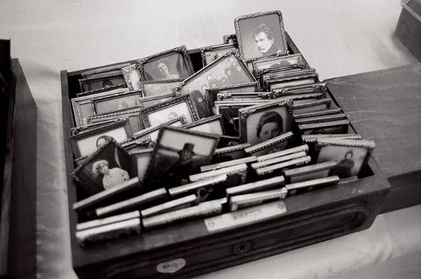 Collection of old family photos in a vintage box